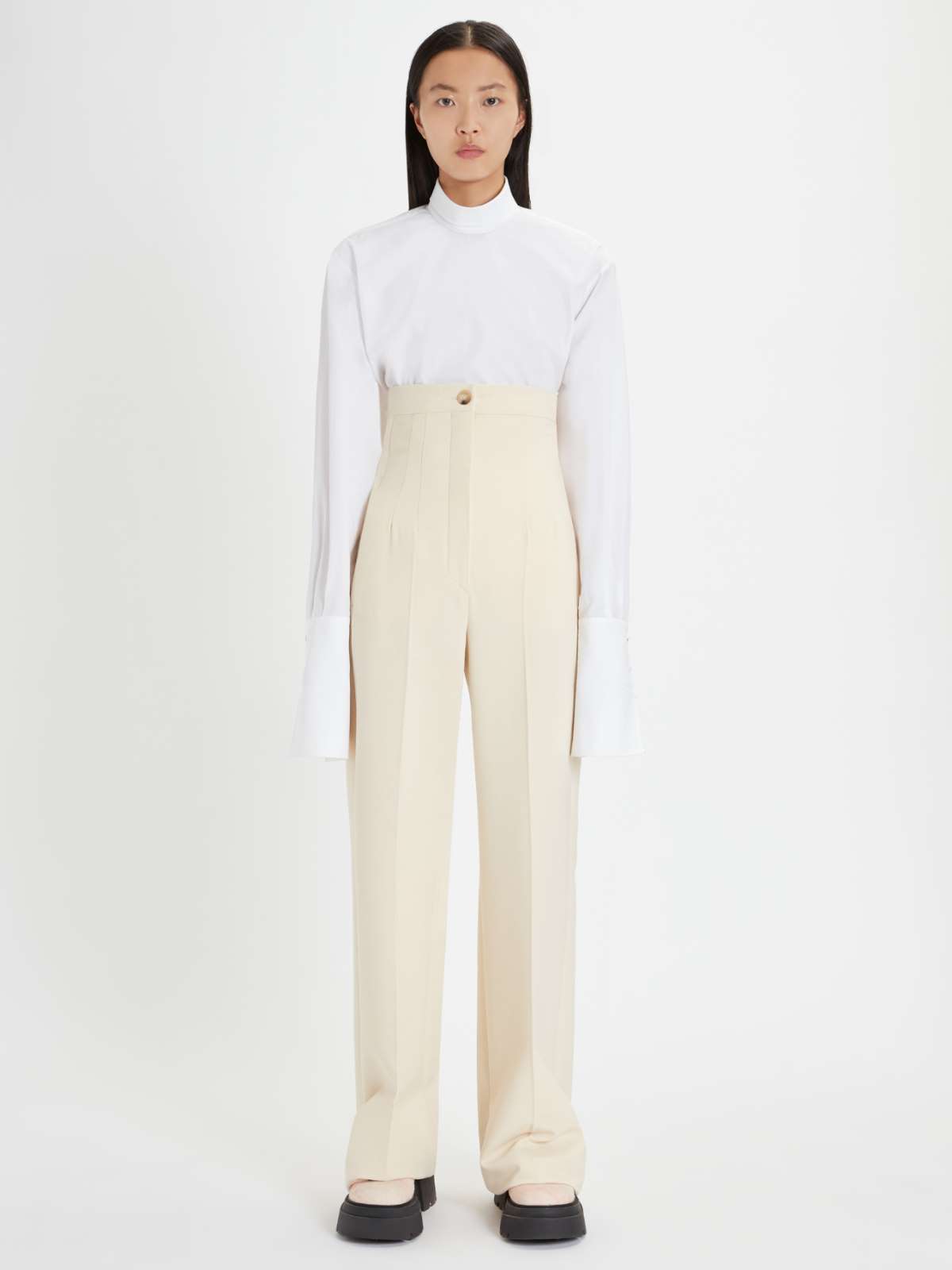 white stretch trousers