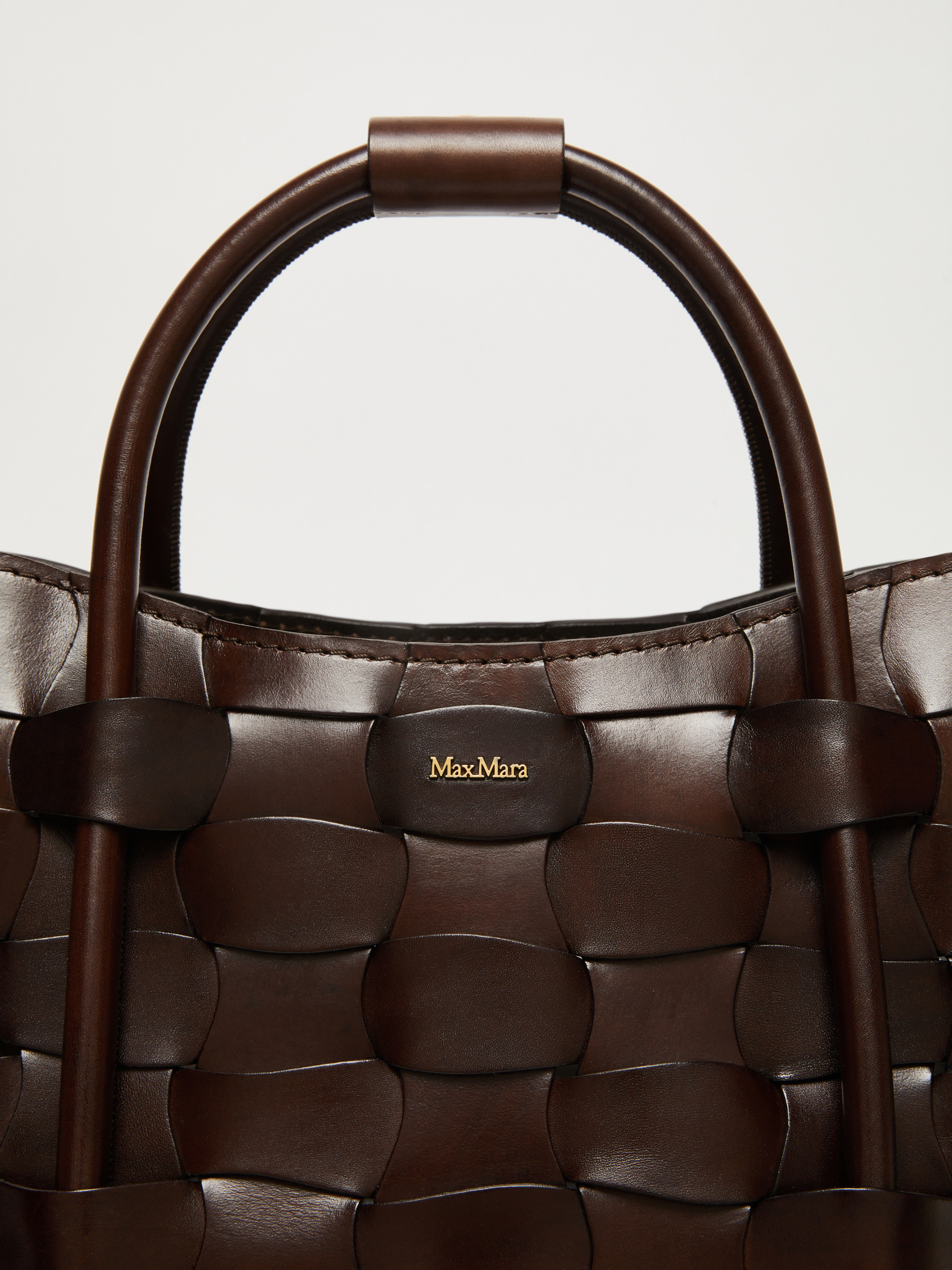 Tasche Marine Small aus geflochtenem Leder, dunkel braun 