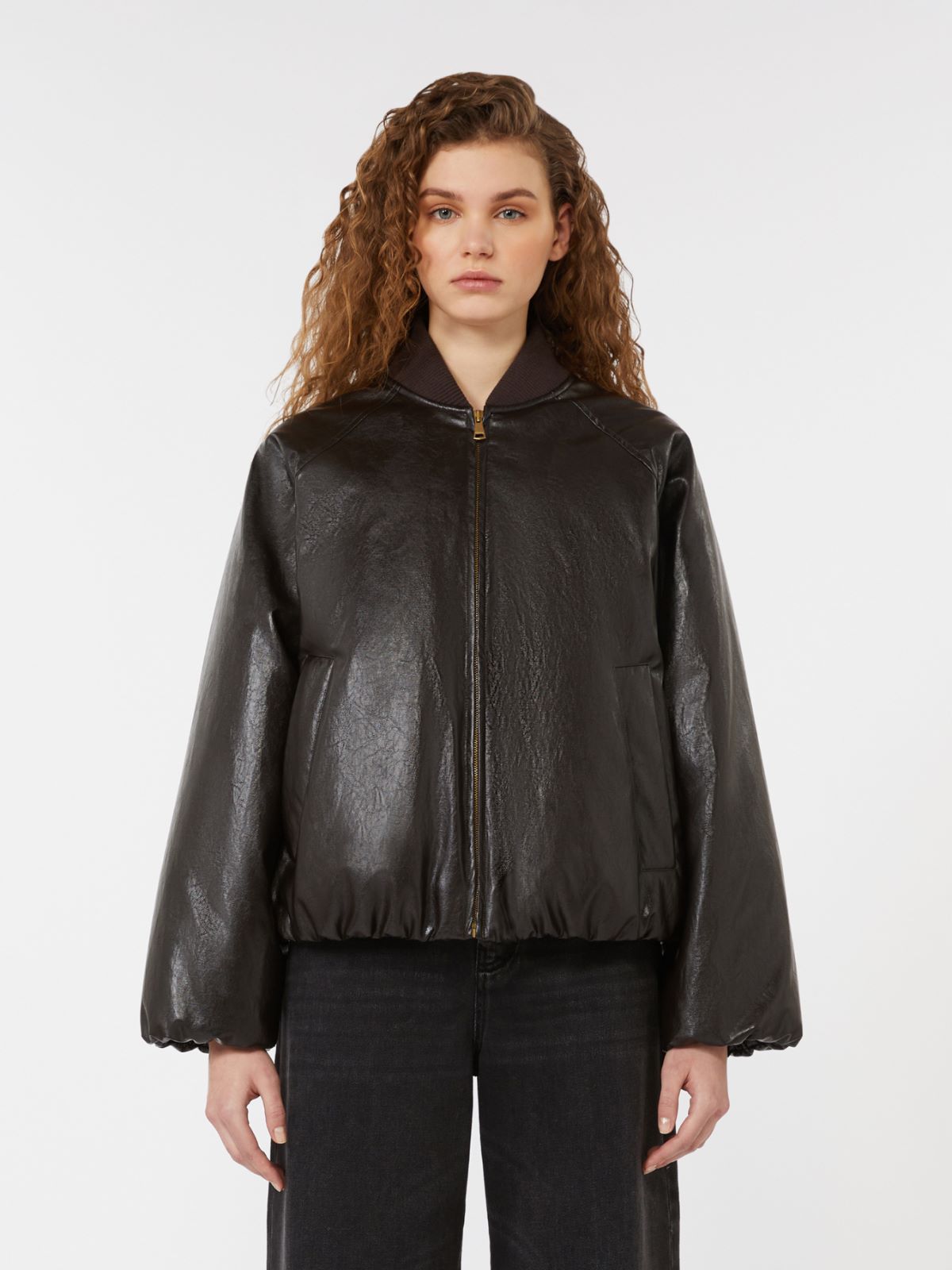 Chaqueta bomber corta de punto revestido