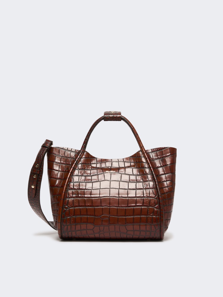 Small crocodile-print leather Marine bag