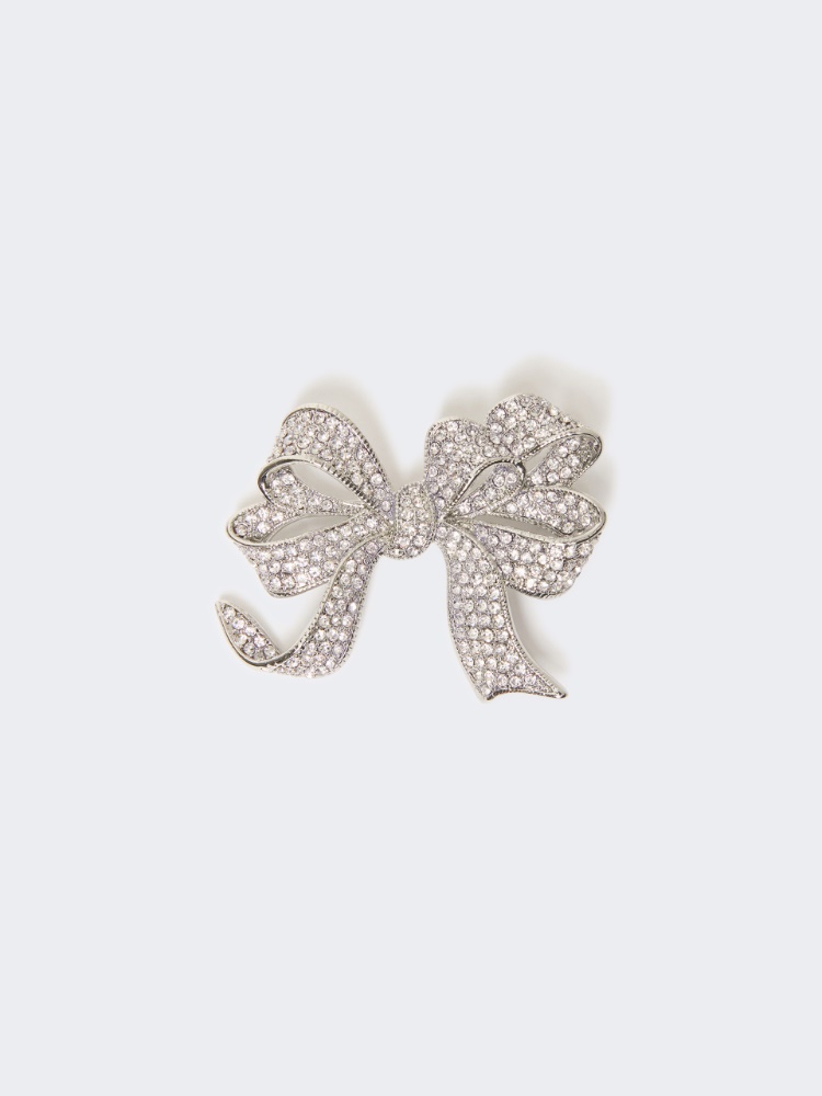 Metal brooch with rhinestones - SILVER
